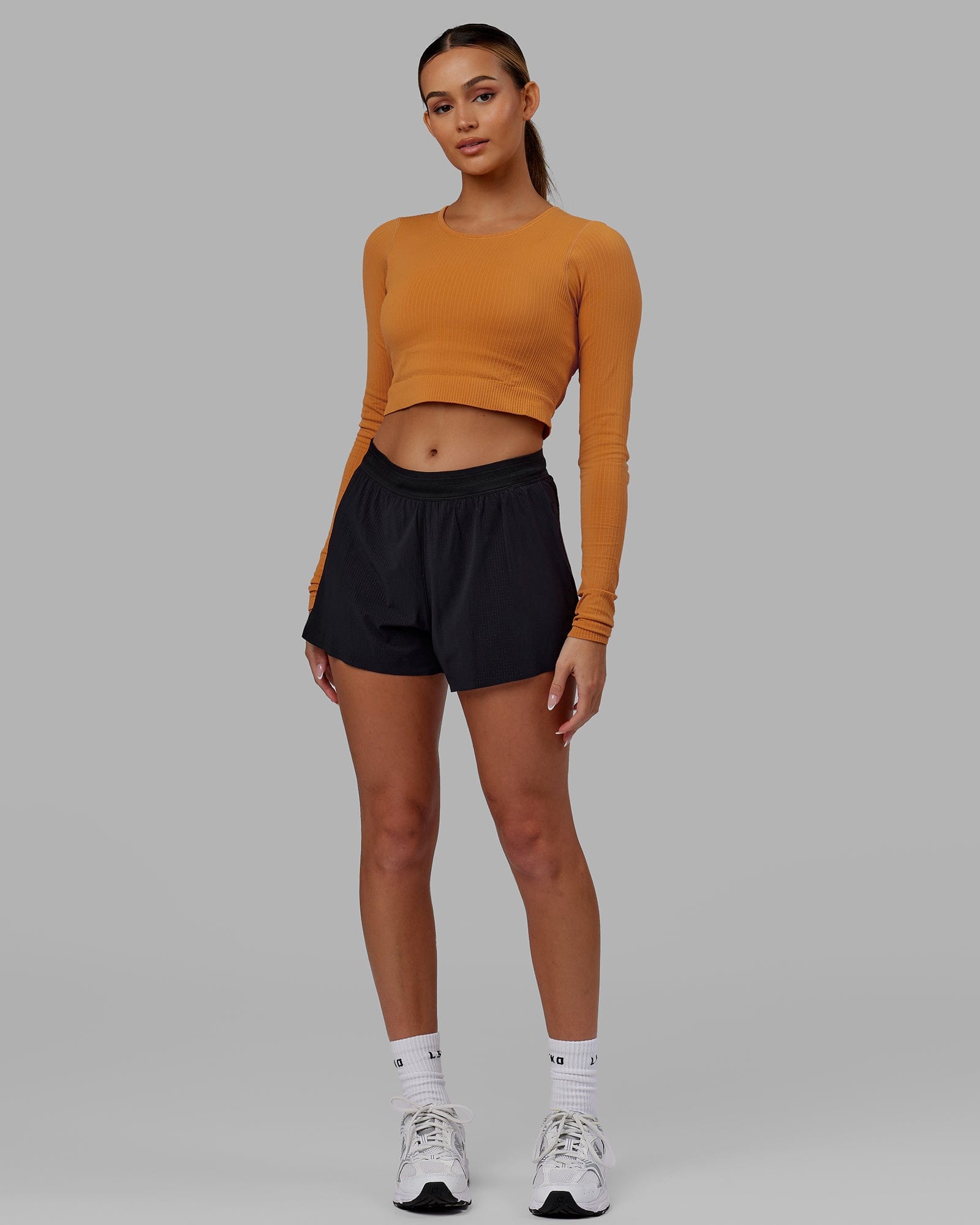 Woman wearing Ultra Soft Seamless Long Sleeve Top - Sundial