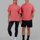 Man and Woman wearing Unisex Strive FLXCotton Tee Oversize - Sunkist Coral