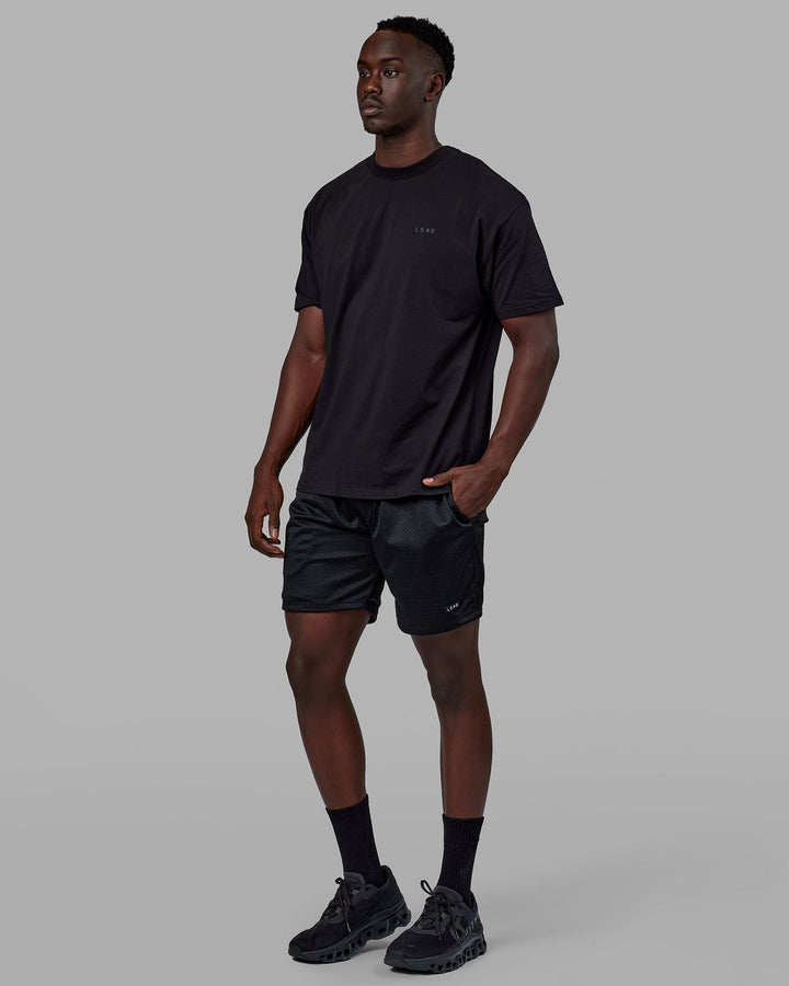 Man wearing Unisex VS6 FLXCotton Tee Oversize - Triple Black