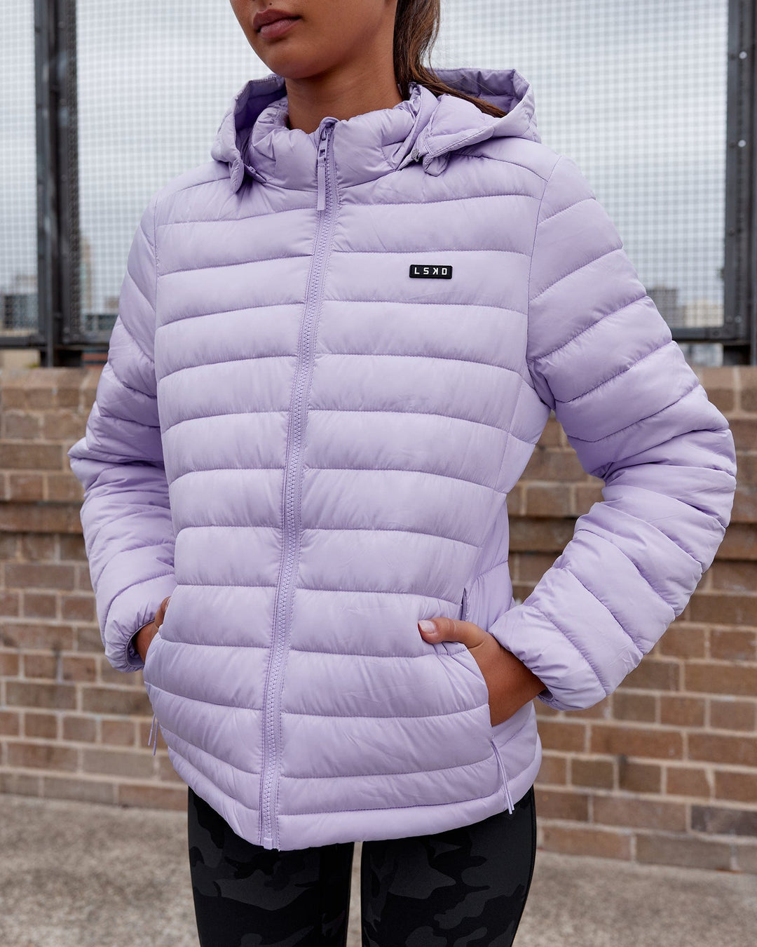 Woman wearing All-day Puffer Jacket - Pale Lilac