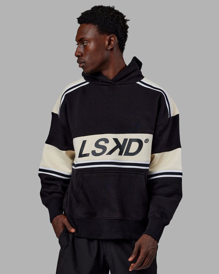 Man wearing Unisex A-Team Hoodie Oversize - Black-Bone