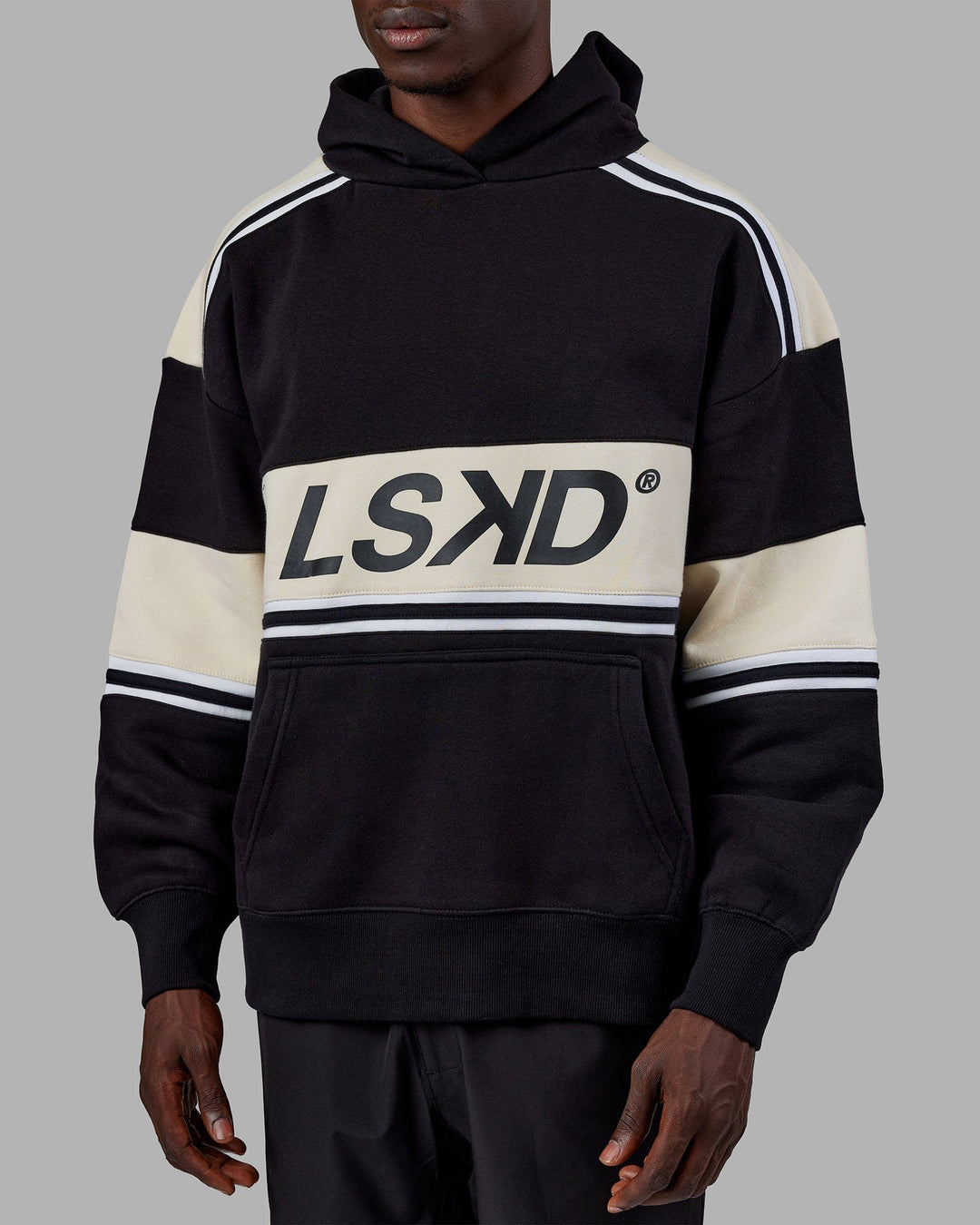 Man wearing Unisex A-Team Hoodie Oversize - Black-Bone