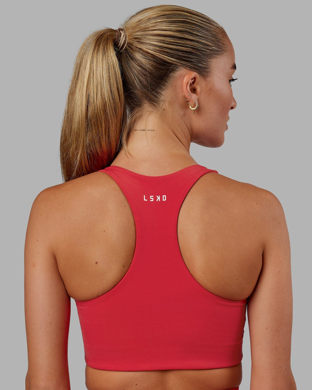 Woman wearing Ace Long Line Bra - Scarlet