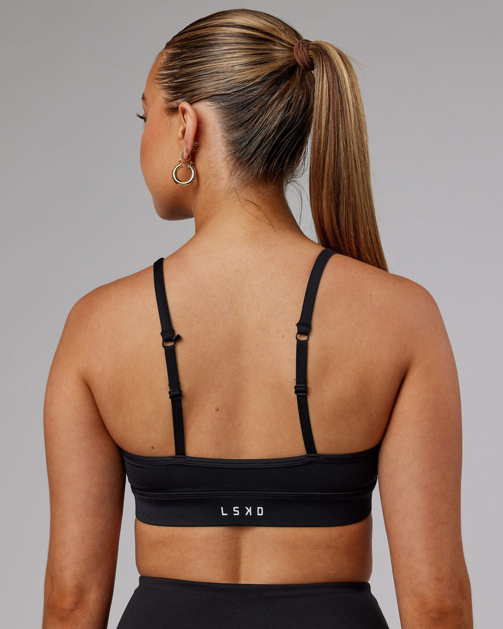 Woman wearing Advantage Sports Bra - Black