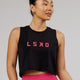Woman wearing Agile FLXCotton Tank - Black-Boysenberry