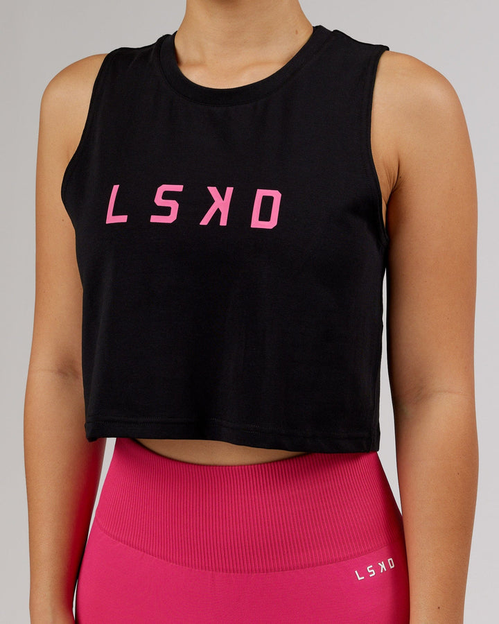 Woman wearing Agile FLXCotton Tank - Black-Magenta