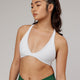 Woman wearing Agile Sports Bra - White