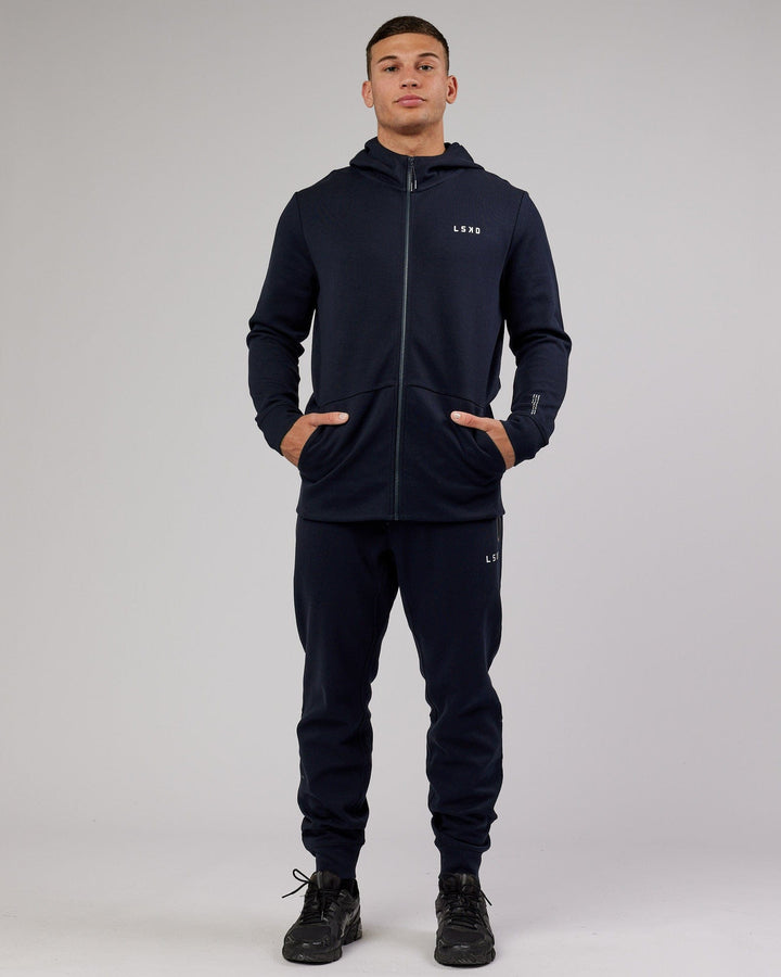 Man wearing Athlete ForgedFleece Zip Up Hoodie - Dark Navy