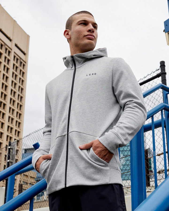 Man wearing Athlete ForgedFleece Zip Up Hoodie - Lt Grey Marl
