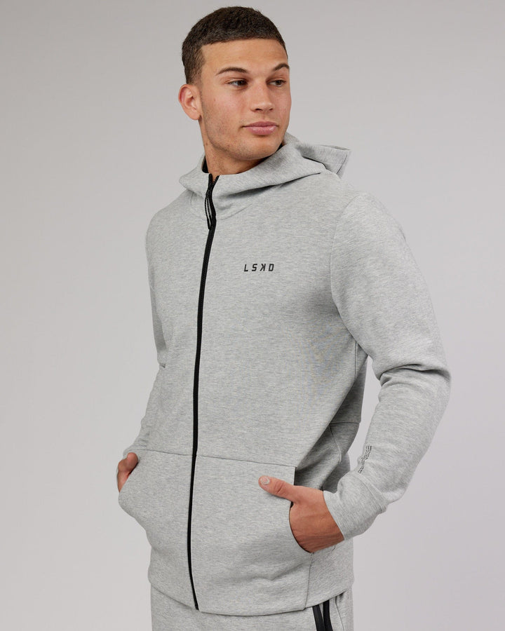 Man wearing Athlete ForgedFleece Zip Up Hoodie - Lt Grey Marl