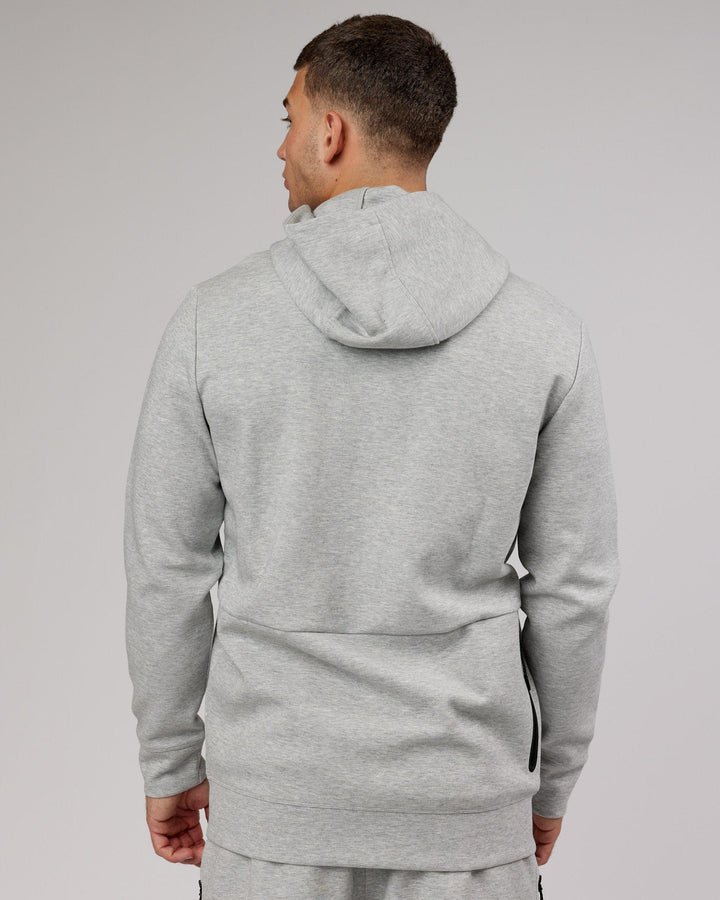 Man wearing Athlete ForgedFleece Zip Up Hoodie - Lt Grey Marl