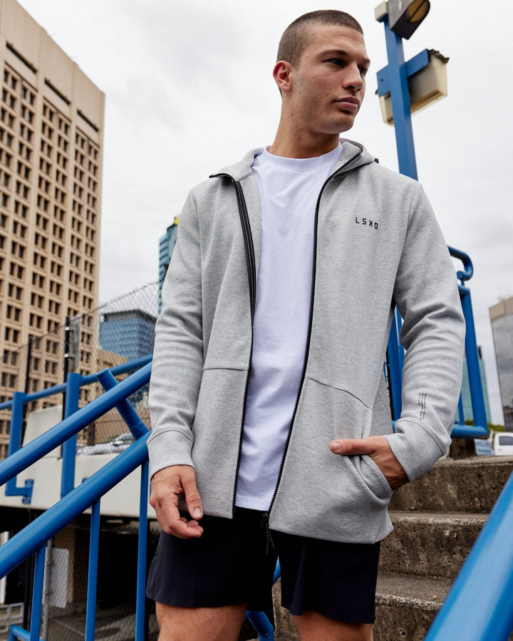 Man wearing Athlete ForgedFleece Zip Up Hoodie - Lt Grey Marl