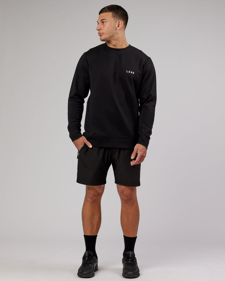 Man wearing Athlete ForgedFleece Sweater - Black