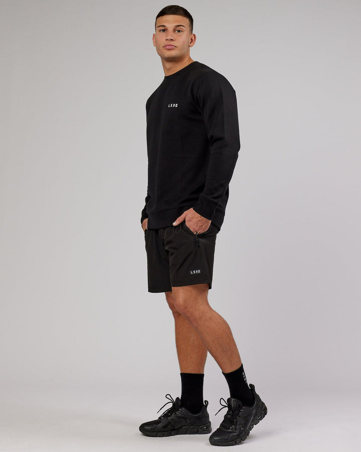 Man wearing Athlete ForgedFleece Sweater - Black
