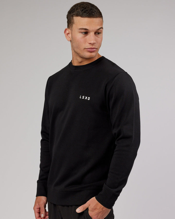 Man wearing Athlete ForgedFleece Sweater - Black