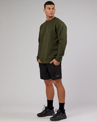 Man wearing Athlete ForgedFleece Sweater - Forest Night