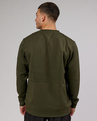 Man wearing Athlete ForgedFleece Sweater - Forest Night