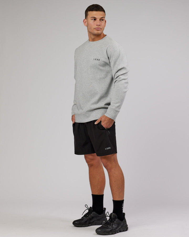 Man wearing Athlete ForgedFleece Sweater - Lt Grey Marl