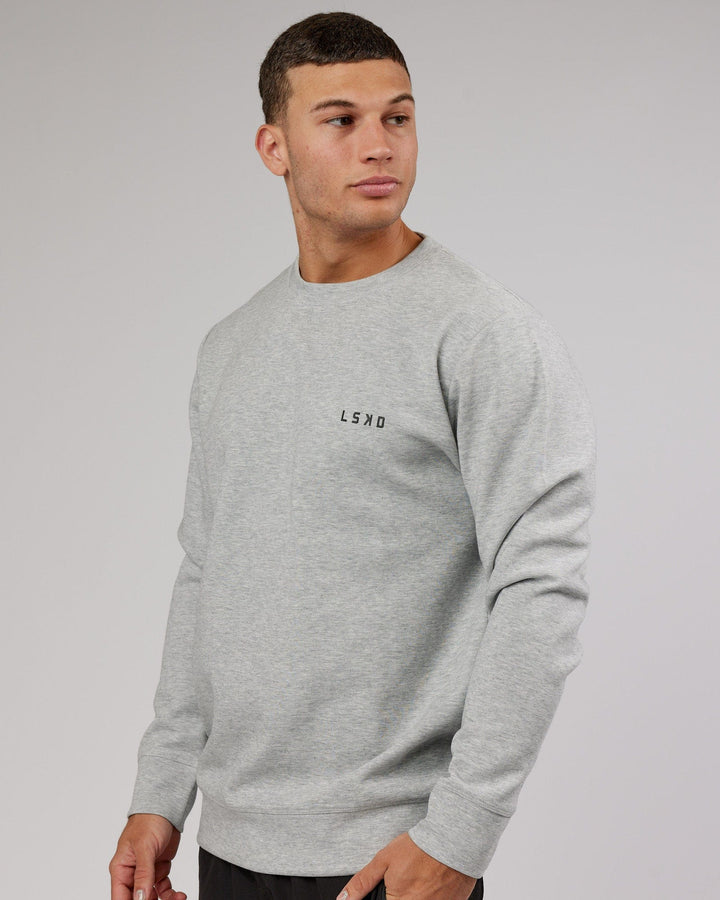 Man wearing Athlete ForgedFleece Sweater - Lt Grey Marl