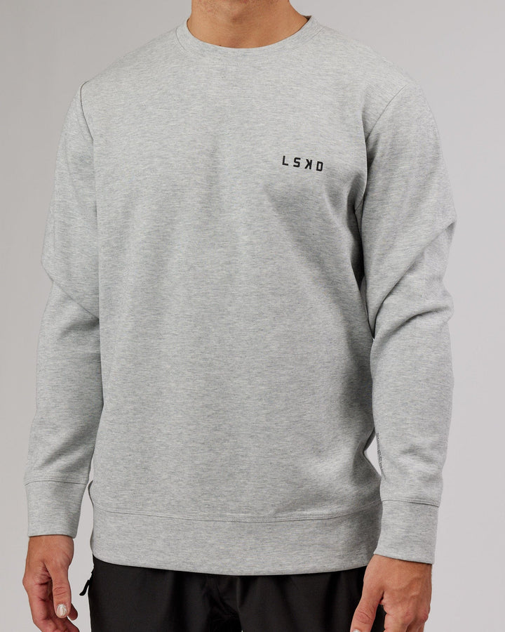 Man wearing Athlete ForgedFleece Sweater - Lt Grey Marl