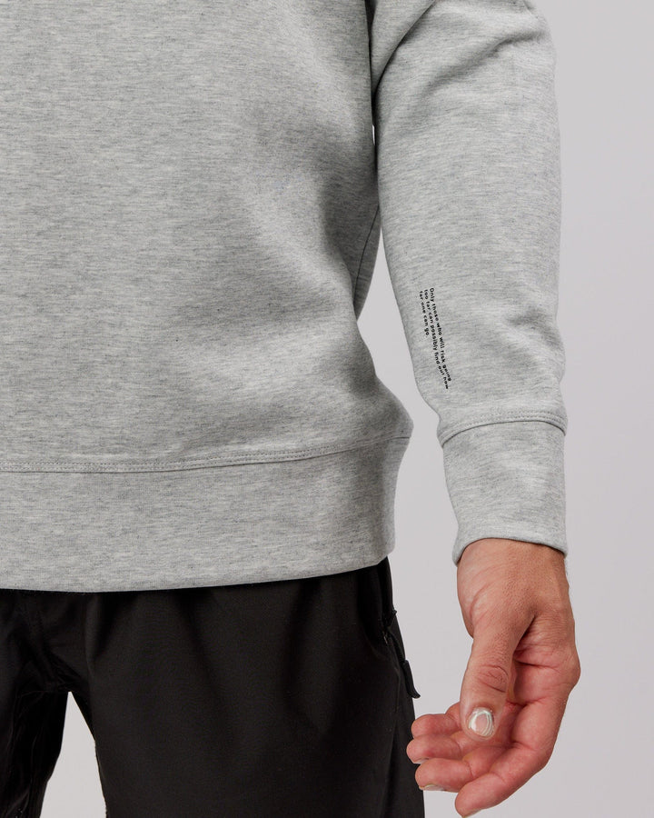 Man wearing Athlete ForgedFleece Sweater - Lt Grey Marl
