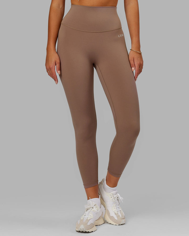 Woman wearing Base 2.0 7/8 Length Tight - Deep Taupe