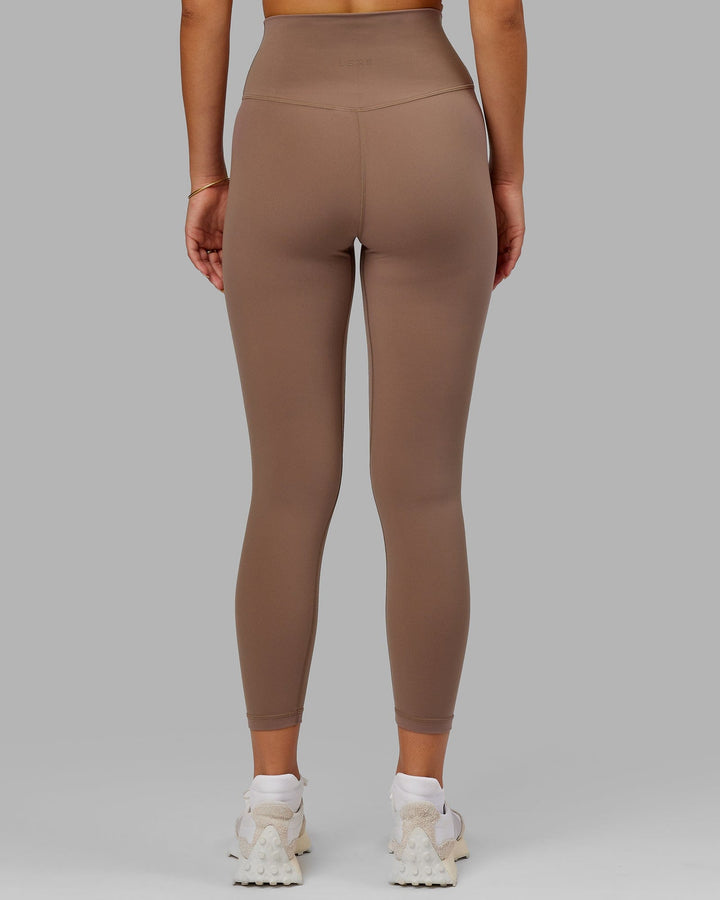 Woman wearing Base 2.0 7/8 Length Tight - Deep Taupe