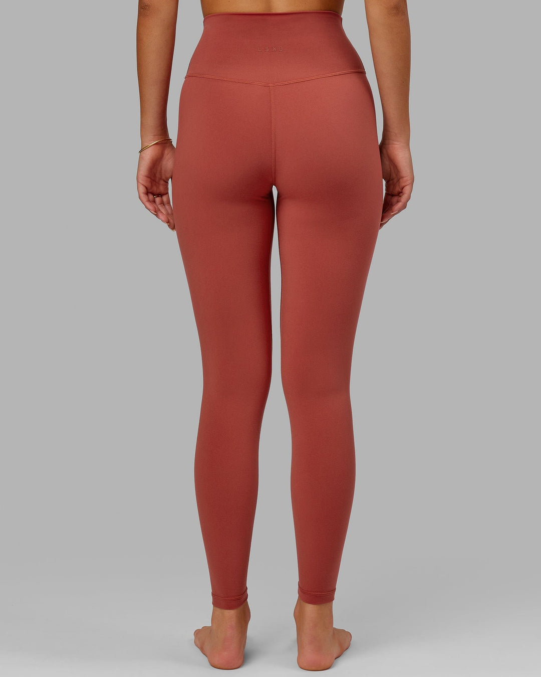 Woman wearing Base 2.0 Full Length Tight - Paprika