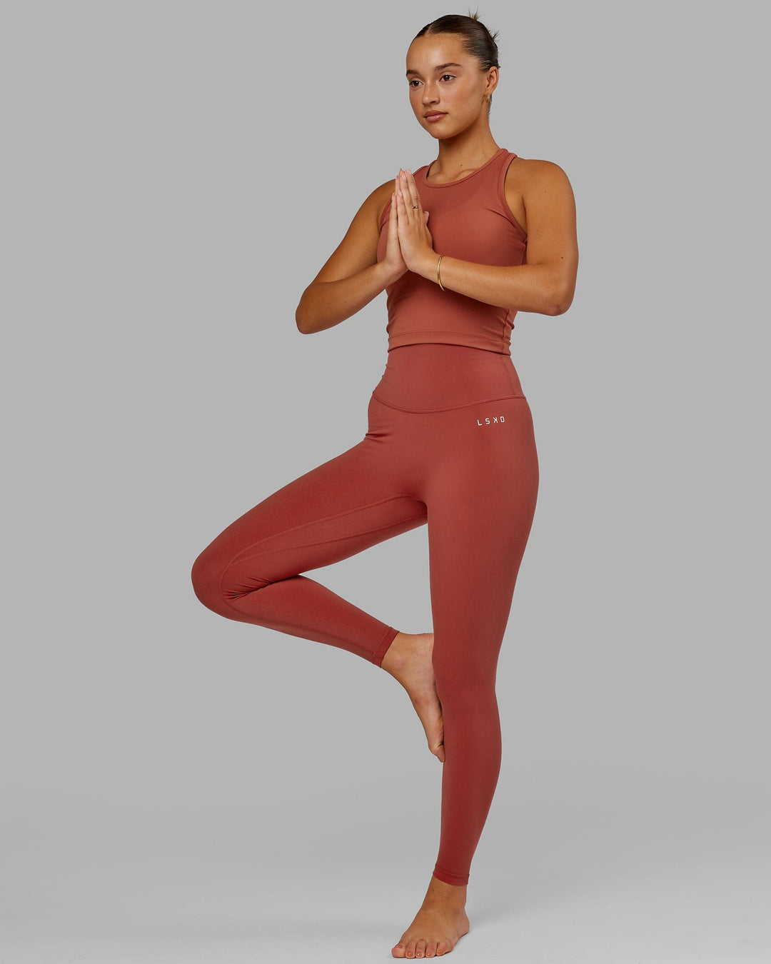 Woman wearing Base 2.0 Full Length Tight - Paprika