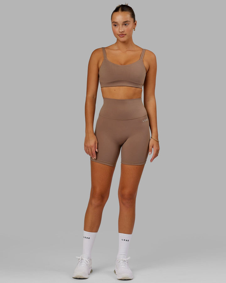 Woman wearing Base 2.0 Mid Short Tight - Deep Taupe
