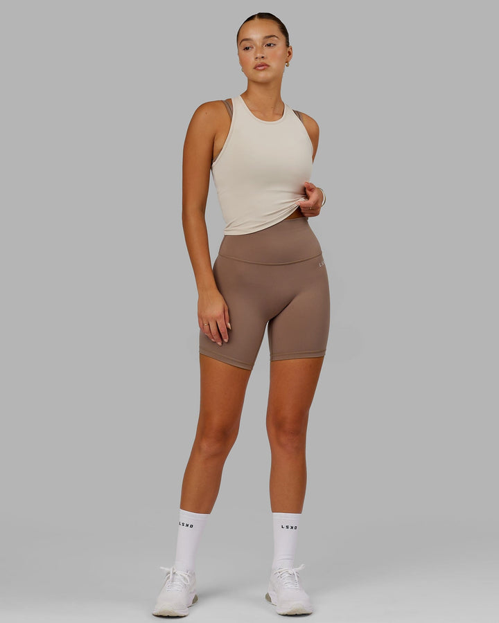 Woman wearing Base 2.0 Mid Short Tight - Deep Taupe