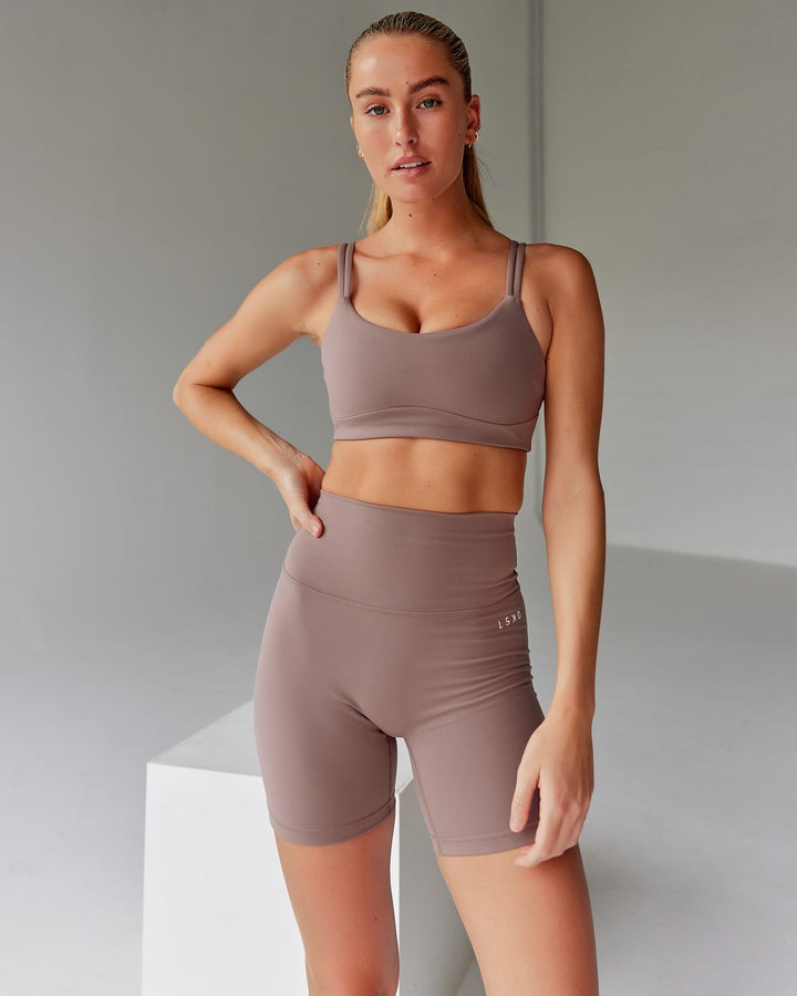 Woman wearing Base 2.0 Mid Short Tight - Deep Taupe