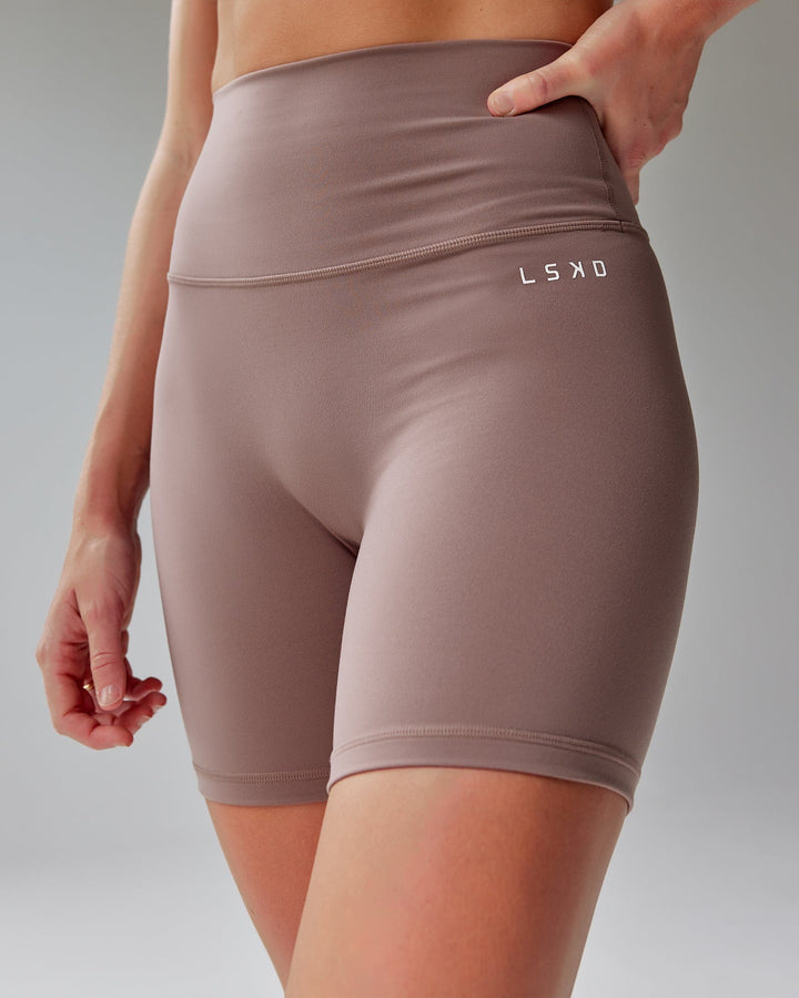 Woman wearing Base 2.0 Mid Short Tight - Deep Taupe