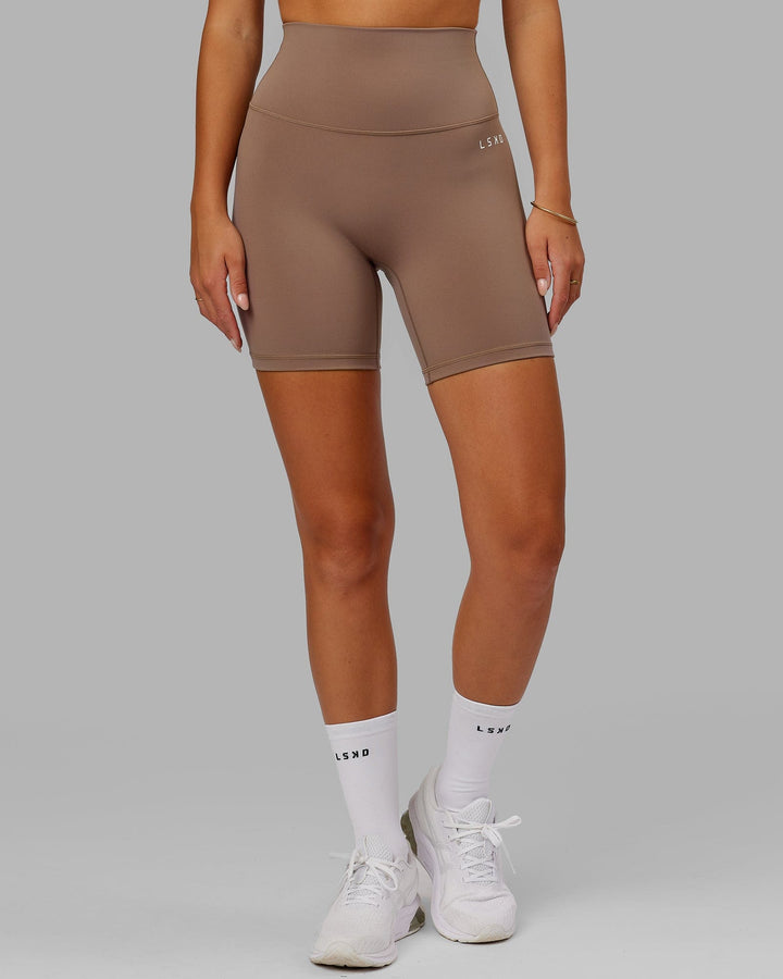 Woman wearing Base 2.0 Mid Short Tight - Deep Taupe