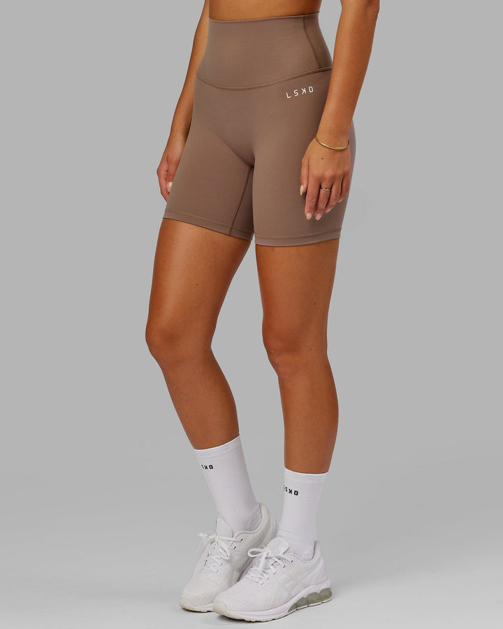 Woman wearing Base 2.0 Mid Short Tight - Deep Taupe