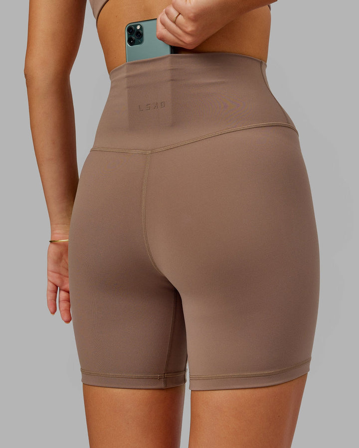 Woman wearing Base 2.0 Mid Short Tight - Deep Taupe