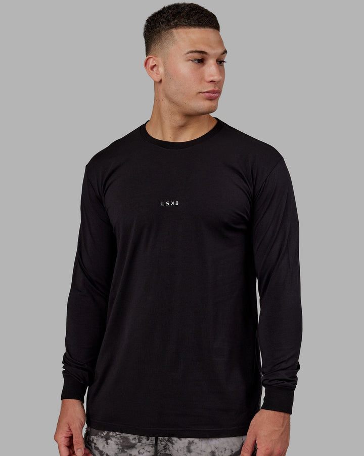 Man wearing Base FLXCotton LS Tee - Black