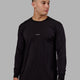 Man wearing Base FLXCotton LS Tee - Black
