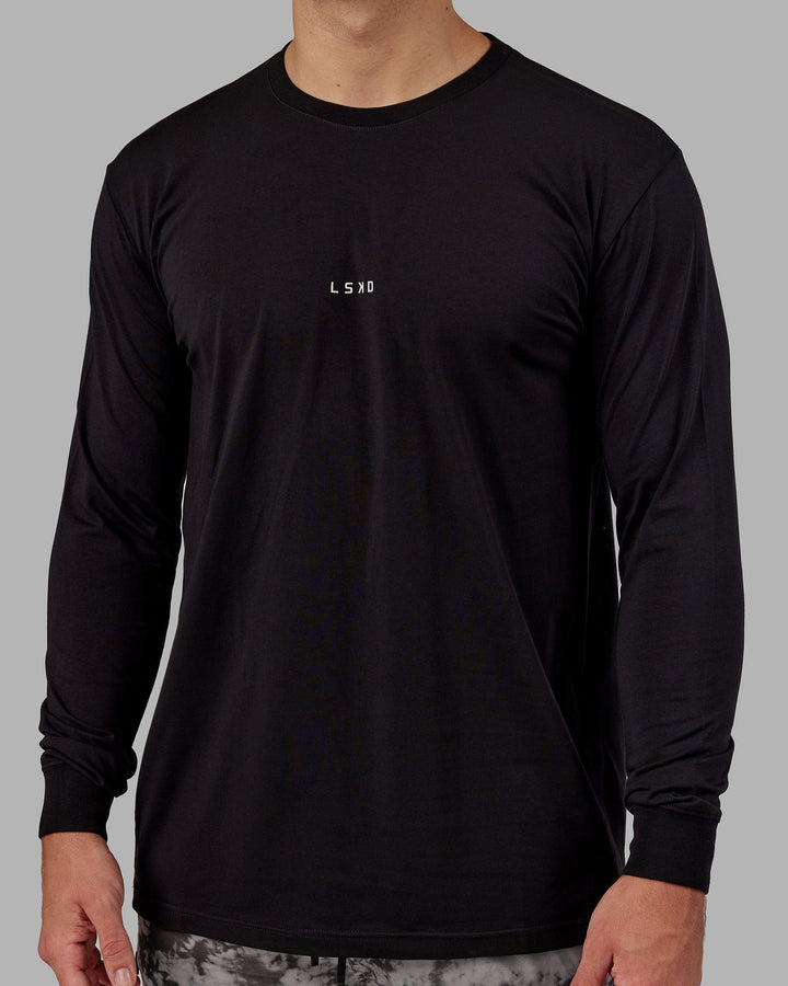 Man wearing Base FLXCotton LS Tee - Black
