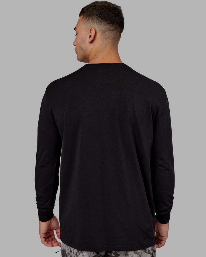 Man wearing Base FLXCotton LS Tee - Black