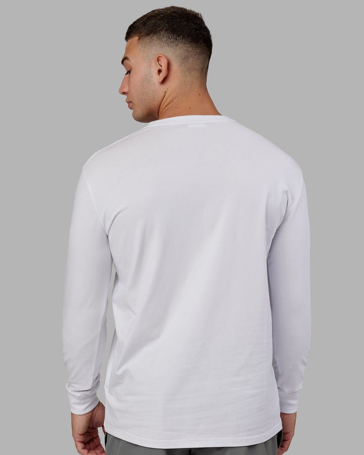 Man wearing Base FLXCotton LS Tee - White