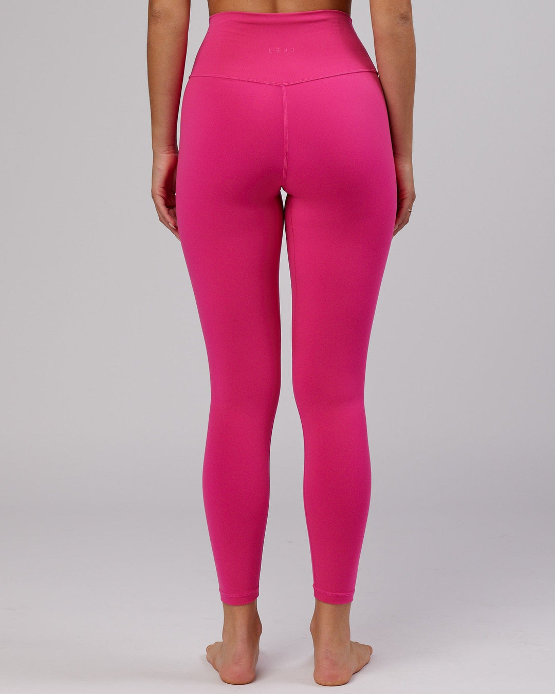 Woman wearing Base Full Length Tight - Magenta