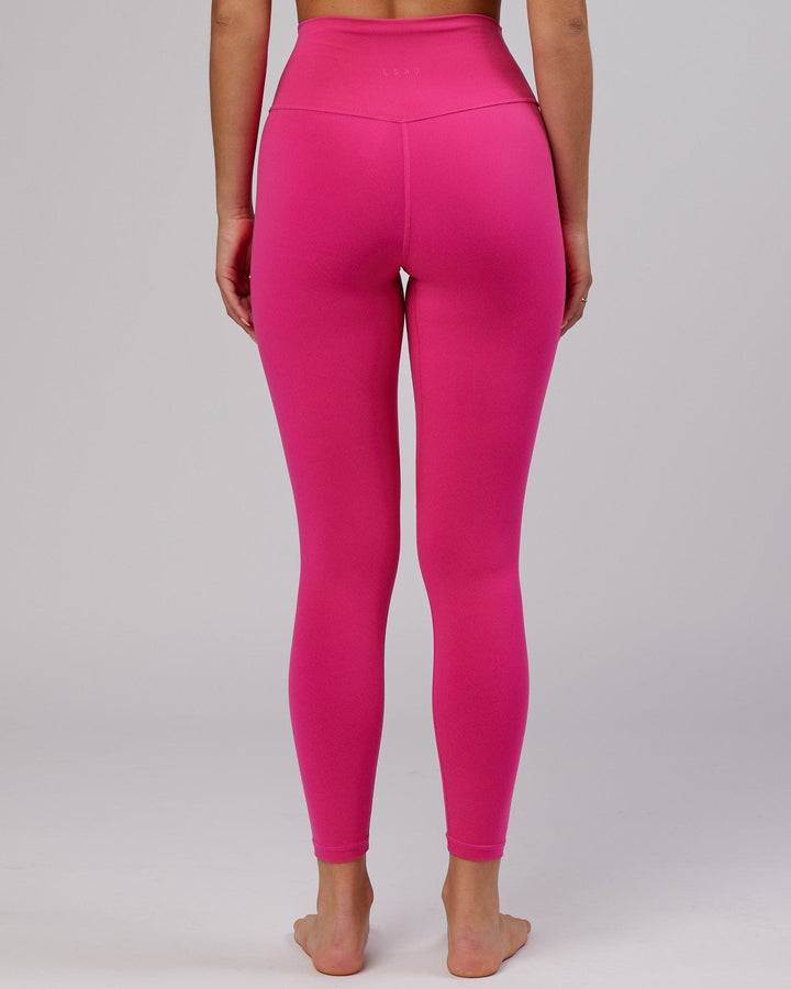 Woman wearing Base Full Length Tight - Magenta