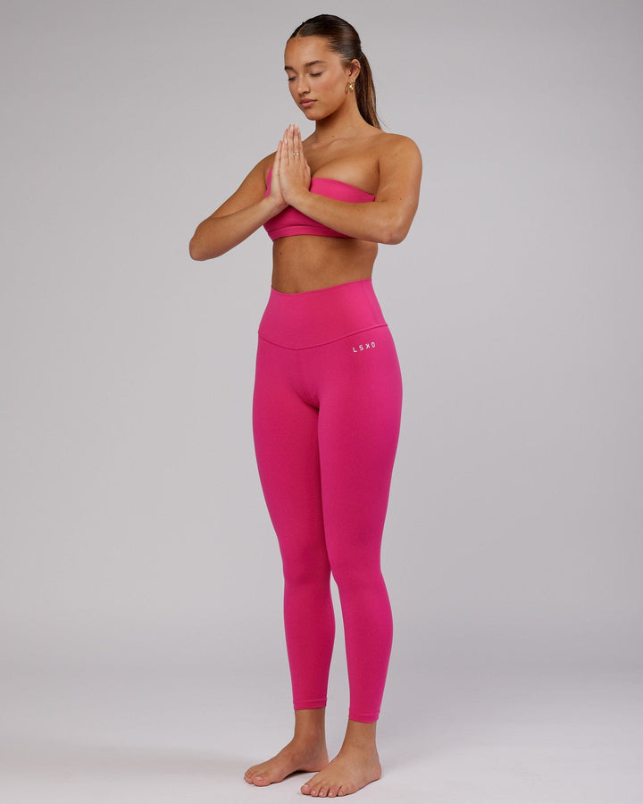 Woman wearing Base Full Length Tight - Magenta