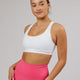 Woman wearing Base Sports Bra - White-Flamingo
