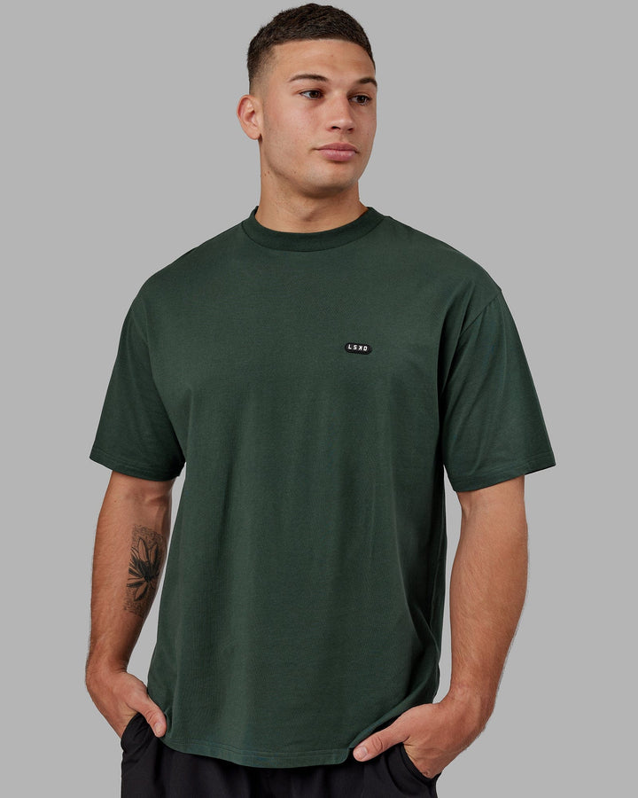 Man wearing Unisex Capsule FLXCotton Tee Oversize - Vital Green