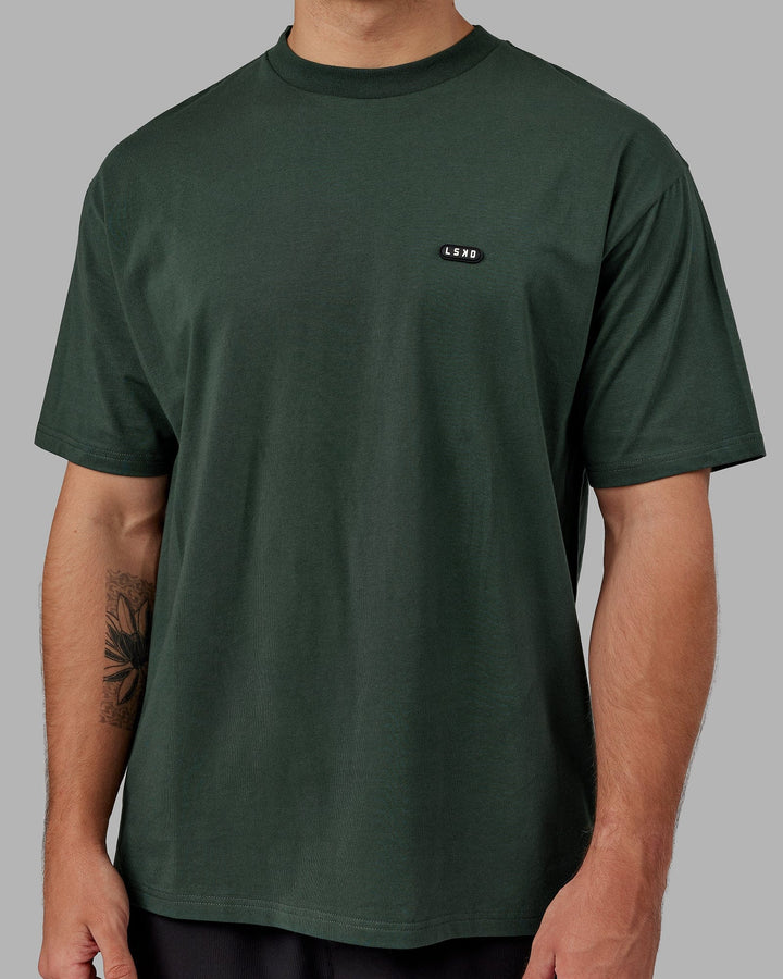 Man wearing Unisex Capsule FLXCotton Tee Oversize - Vital Green