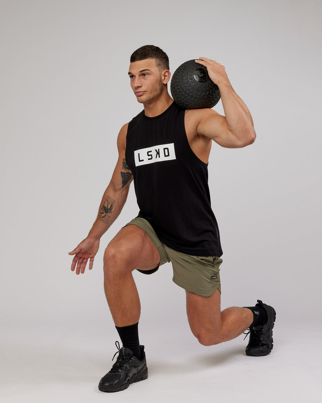 Man wearing Competition 5" Performance Short - Olive Fade