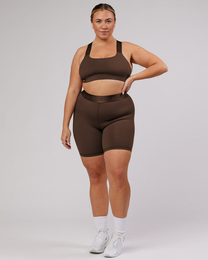 Woman wearing Competition Mid Short Tight - Walnut