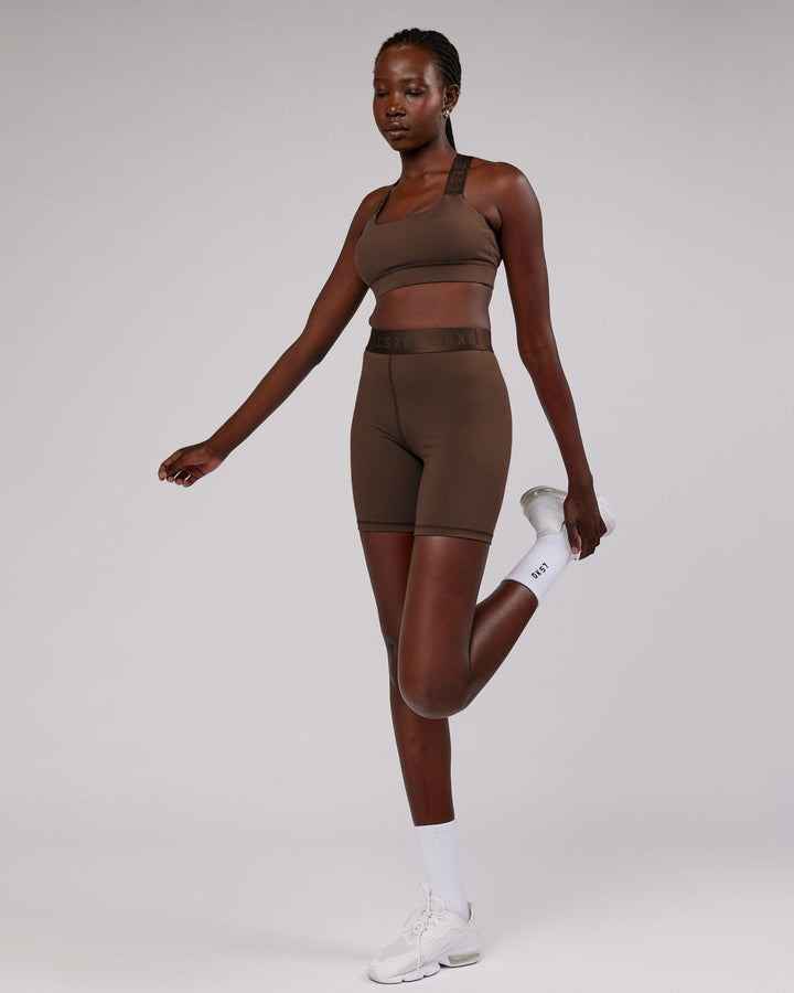 Woman wearing Competition Mid Short Tight - Walnut